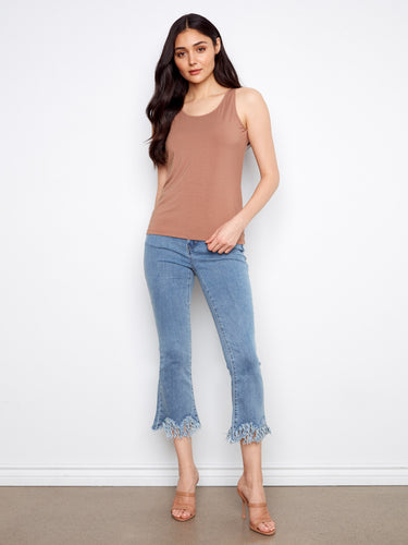 Elevate your look with this scoop neck top that combines simplicity and sophistication effortlessly. Designed by Charlie B.