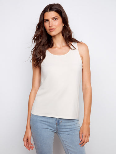 Switch between scoop and V-neck styles effortlessly with this reversible design top. Perfectly versatile! By Charlie B.