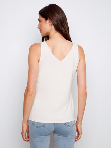 Elevate your wardrobe with this relaxed fit top that offers both a scoop neck and V-neck style. By Charlie B.