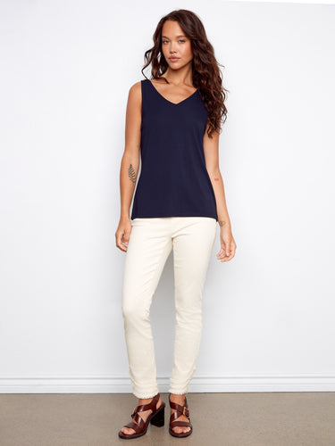 Chic navy top showcasing a flattering V-neck, ideal for both casual and formal looks. A must-have piece by Charlie B.
