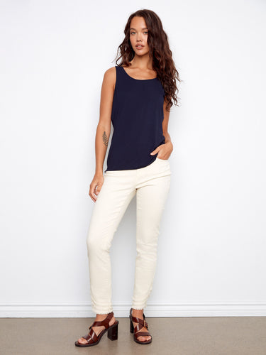 Stylish navy top featuring an elegant V-neck design, perfect for enhancing your wardrobe essentials. Created by Charlie B.