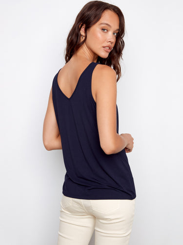 Classic navy top in a comfortable scoop neck style, offering easy elegance and versatility. Designed thoughtfully by Charlie B.