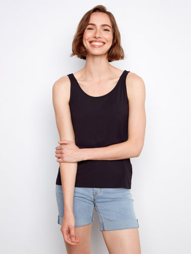 This black bamboo cami features a V-neckline, offering comfort with its relaxed fit by Charlie B.