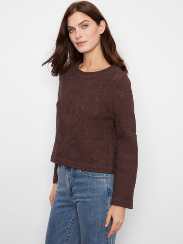 Designed with elegance in mind, the crew neckline provides sophistication to any ensemble. Produced by Charlie B.