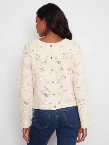 Natural crochet cardigan showcasing a reversible design, perfect for versatile fashion choices by Charlie B.