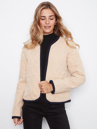 Showcasing a reversible design, this jacket offers versatile styling options for various occasions by Charlie B.