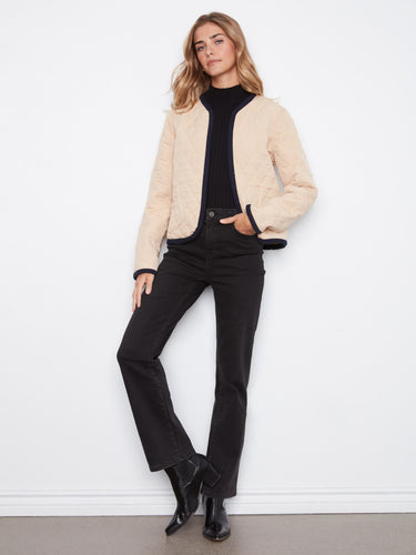 Designed with edge binding, this jacket adds a polished finish to your ensemble by Charlie B.