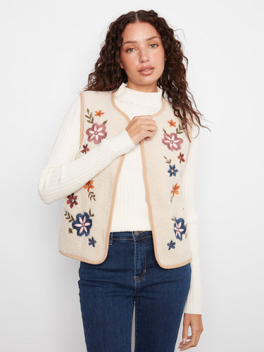Floral embroidered sherpa vest with a crew neck and open-front design, perfect for layering by Charlie B.