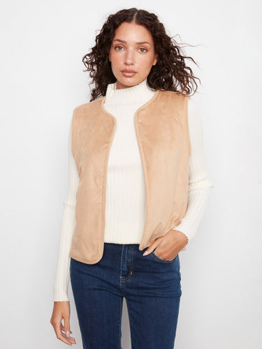 Faux suede reversible vest adds a touch of elegance to any outfit with its sleek design by Charlie B.