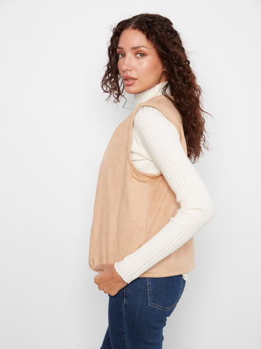 Enjoy the simplicity of the faux suede reverse side in this open-front sleeveless vest by Charlie B.