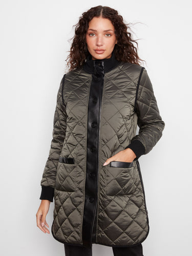 Quilted puffer jacket in green with sleek snap-button closure and elegant patch pockets by Charlie B.