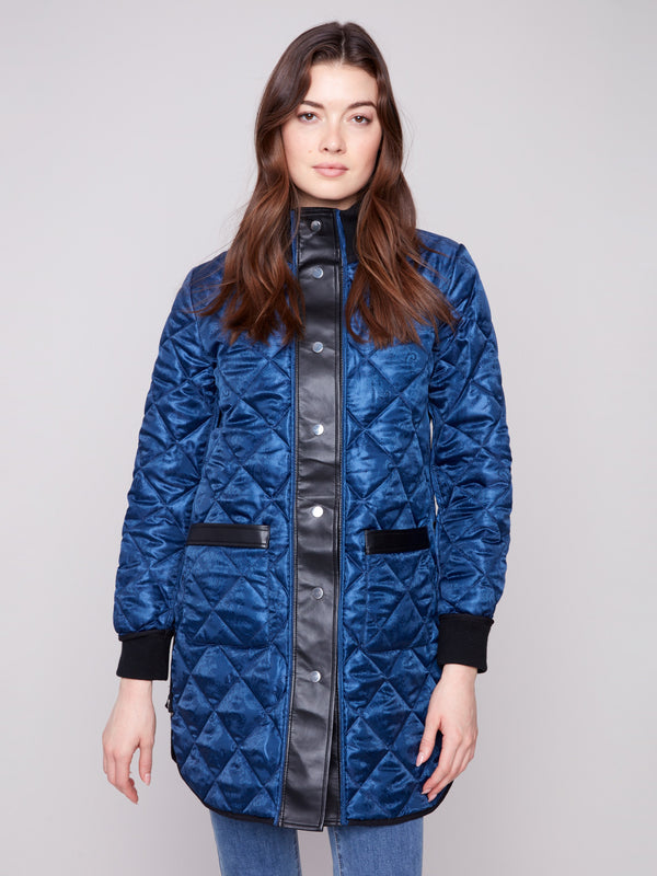 Navy jacket with two front patch pockets and rib-knit cuffs, combining practicality and style by Charlie B.