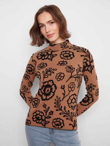Reversible floral sweater in soft tones, featuring long sleeves for versatile wear. By Charlie B.
