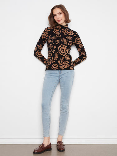 Chic floral print top with a mock neck design and comfortable slim fit. By Charlie B.