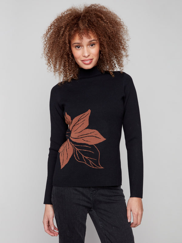 Leaf-patterned sweater with a slim fit, showcasing a reversible design and mock neck by Charlie B.