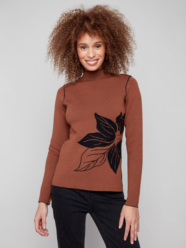 Mock neck sweater featuring a bold leaf pattern and long sleeves for a sleek look by Charlie B.