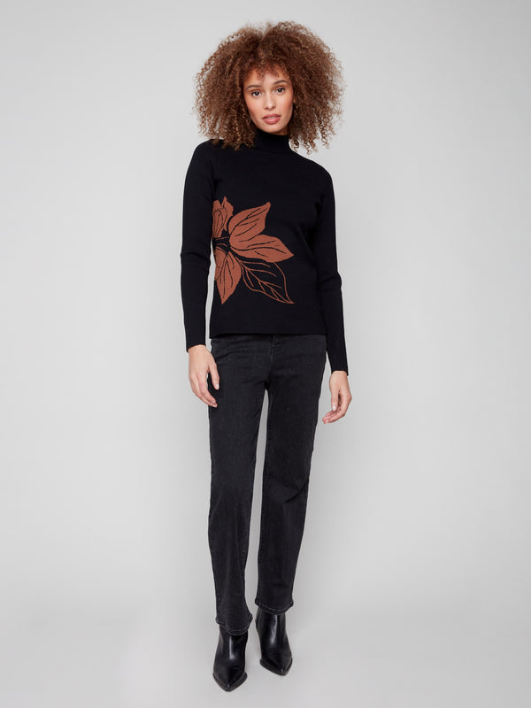 Stylish mock neck sweater with reversible feature, highlighted by a striking leaf pattern by Charlie B.