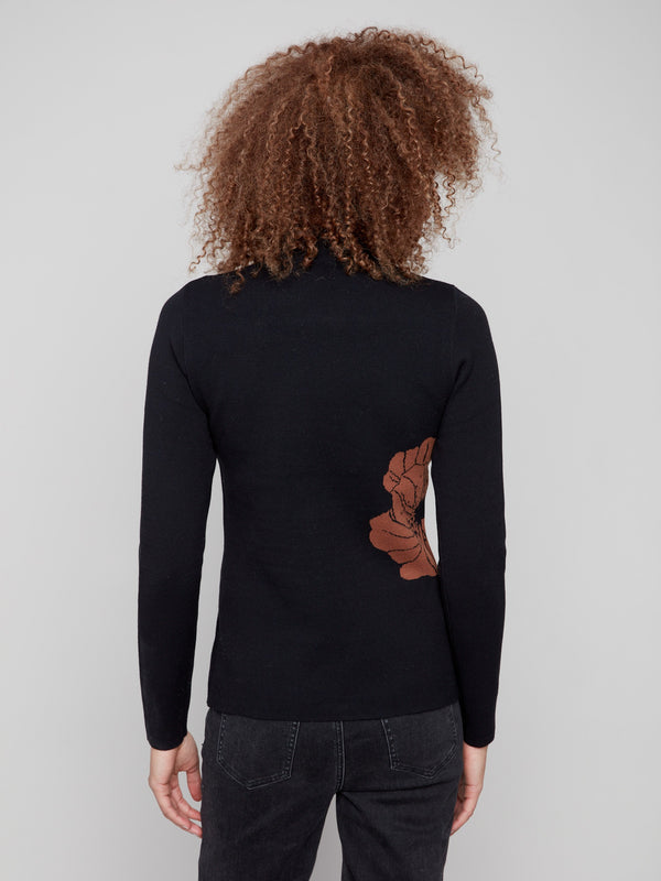 Elegant reversible design with a unique leaf pattern on this cozy sweater by Charlie B.