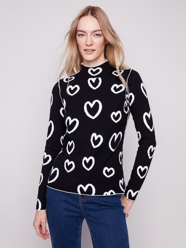 Chic reversible sweater featuring long sleeves and heart motifs, ideal for any casual outing by Charlie B.