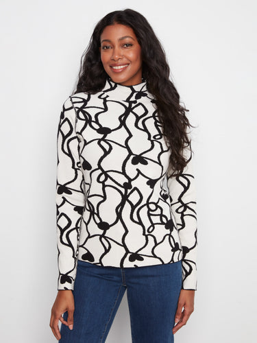 This slim fit top features a unique reversible design, offering two looks in one. Ideal for modern fashion lovers. By Charlie B.