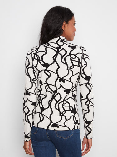 Versatile and stylish, this reversible design offers endless possibilities while maintaining comfort and chic appeal. By Charlie B.