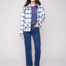 Plaid jacket featuring a classic shirt collar, perfect for versatile styling by Charlie B.