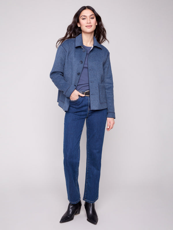 Elegant button front closure enhances the timeless appeal of this plaid jacket by Charlie B.