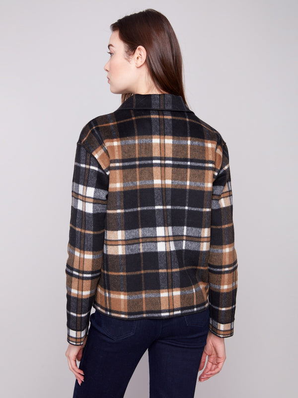 Reversible plaid jacket highlighting its unique design and modern appeal by Charlie B.
