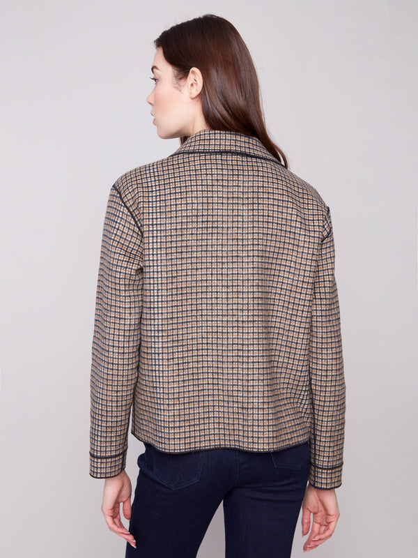 Sophisticated reversible design on this cacao plaid jacket offers dual styling options by Charlie B.
