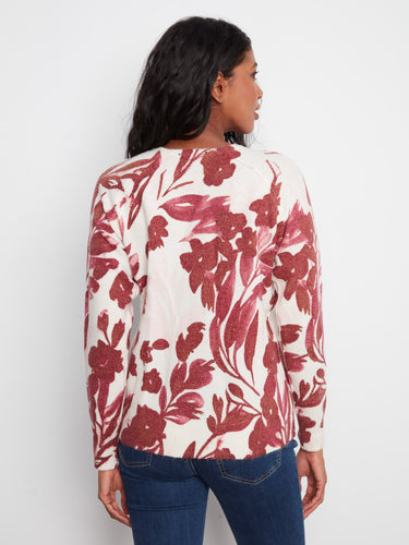 Long raglan sleeves complement the beautiful floral pattern on this versatile reversible sweater, enhancing your wardrobe basics by Charlie B.