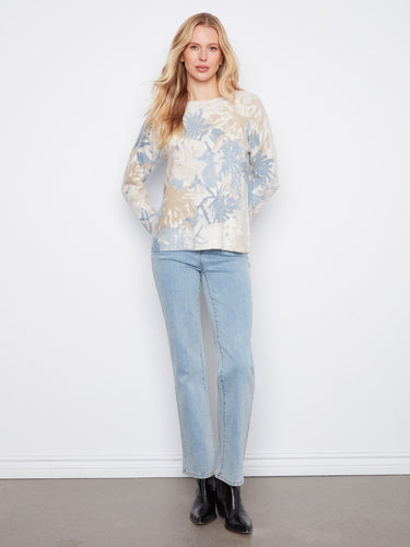 Chic sweater with an eye-catching abstract print, offering versatility and style for everyday wear by Charlie B.