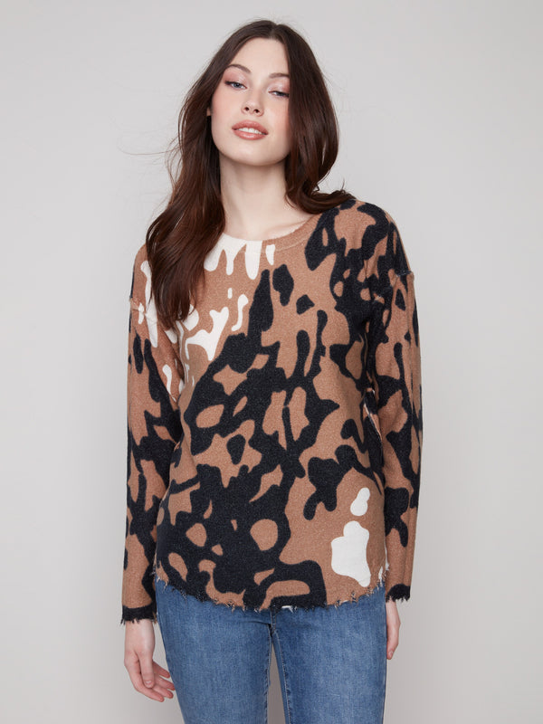Brown and black spotted plush sweater featuring a crew neckline and frayed edges, perfect for casual outings by Charlie B.