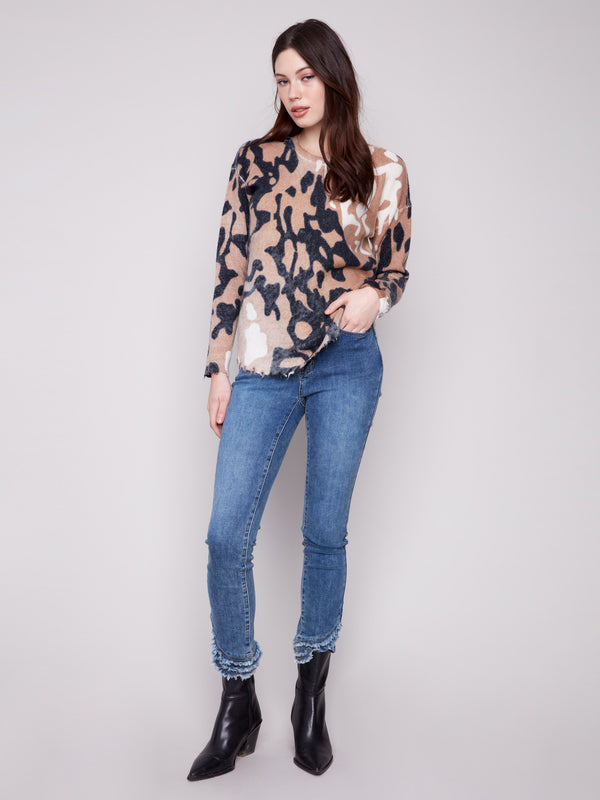 Reversible design brown and black spotted sweater with frayed edges for versatile styling options by Charlie B.