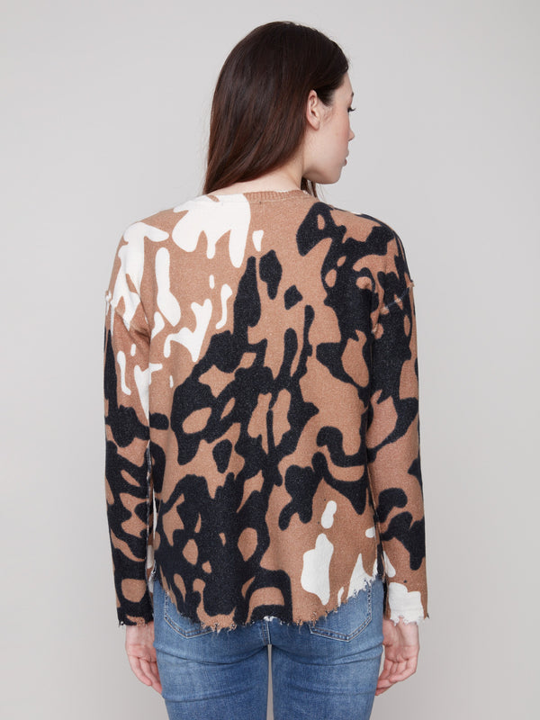 Drop shoulders design on this brown and black spotted plush sweater adds a relaxed fit to your wardrobe by Charlie B.