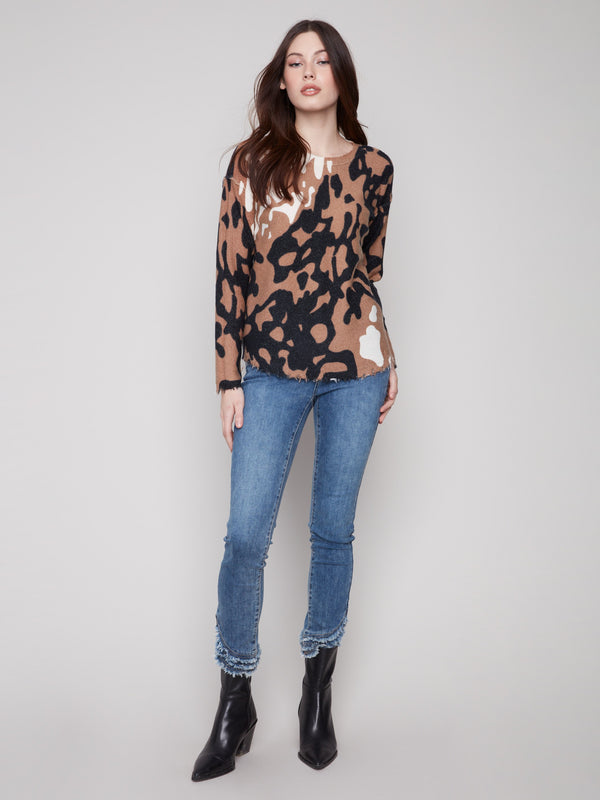 Cozy brown and black spotted sweater with a soft plush texture, ideal for layering in the fall season by Charlie B.