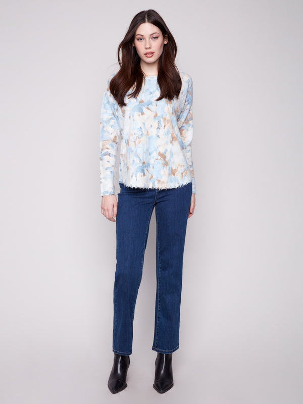 Stylish vapor-toned sweater with an abstract print, featuring drop shoulders design for a relaxed fit by Charlie B.