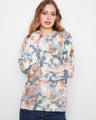 Sweater with a classic crew neck, featuring a playful floral pattern in pastel hues for a stylish touch. By Charlie B.