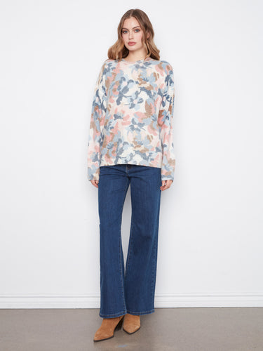 Featuring drop shoulders, this cozy sweater provides a relaxed fit and effortless style for any casual outing. By Charlie B.