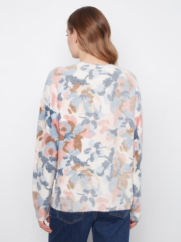 With its drop shoulders, this sweater offers both comfort and style, perfect for everyday wear or special occasions. By Charlie B.