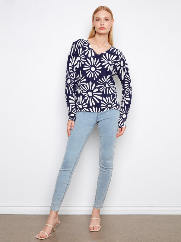 Reversible navy blue floral sweater with a striking design. Perfect for versatile styling options by Charlie B.