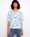 Floral print top in 100% cotton, featuring a classic crew neckline. Perfect for casual outings or layering. By Charlie B.