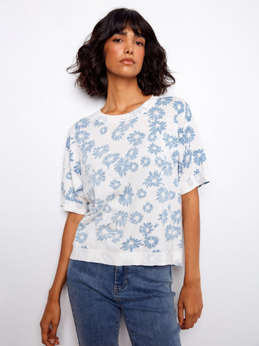 This short sleeve top offers a reversible design, adding versatility to your wardrobe. Made with comfort in mind. By Charlie B.