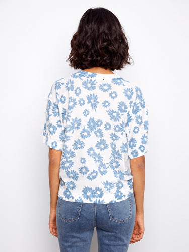 Crafted from high-quality cotton, this piece ensures durability while maintaining a lightweight feel against the skin. By Charlie B.