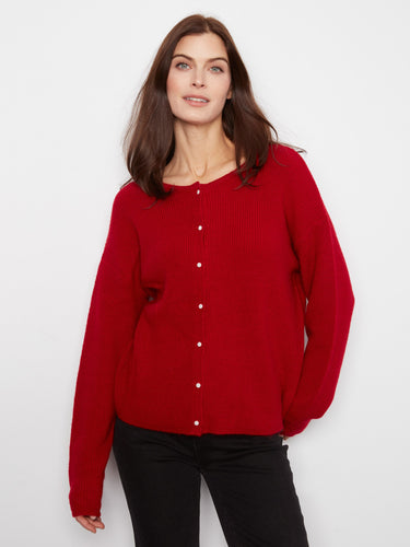 Red sweater with a crew neck, offering a timeless and versatile look. Perfect for any casual outing. By Charlie B.