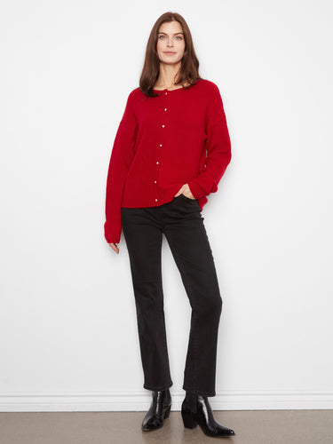 Red sweater with front button closure, adding convenience and style to your wardrobe. By Charlie B.