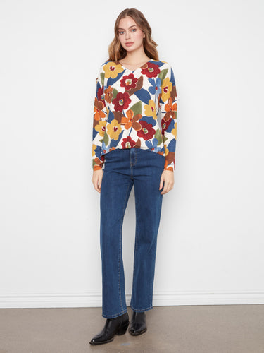 Long sleeves on this floral sweater provide warmth and elegance, making it ideal for cooler days while staying chic by Charlie B.