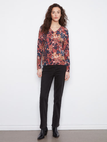 Stylish long-sleeve top with intricate floral design, ideal for layering in cooler weather. Cotton blend fabric ensures comfort by Charlie B.