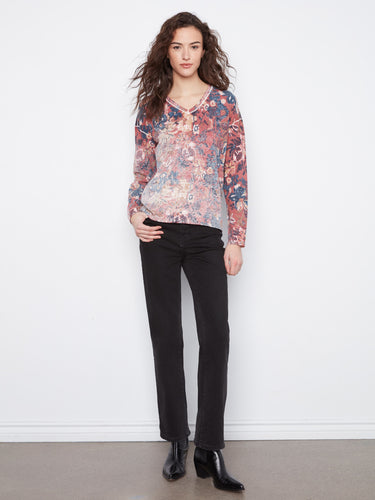 Chic reversible print top showcasing vibrant florals, easily adaptable to different looks. Soft cotton blend material by Charlie B.
