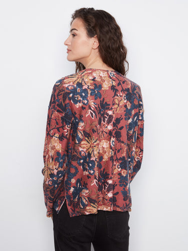 Beautifully crafted floral top with long sleeves and drop shoulders, providing both style and ease of movement by Charlie B.