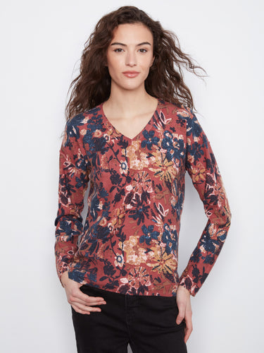 Fashion-forward floral design on this comfortable cotton blend fabric makes it an essential piece in any wardrobe by Charlie B.